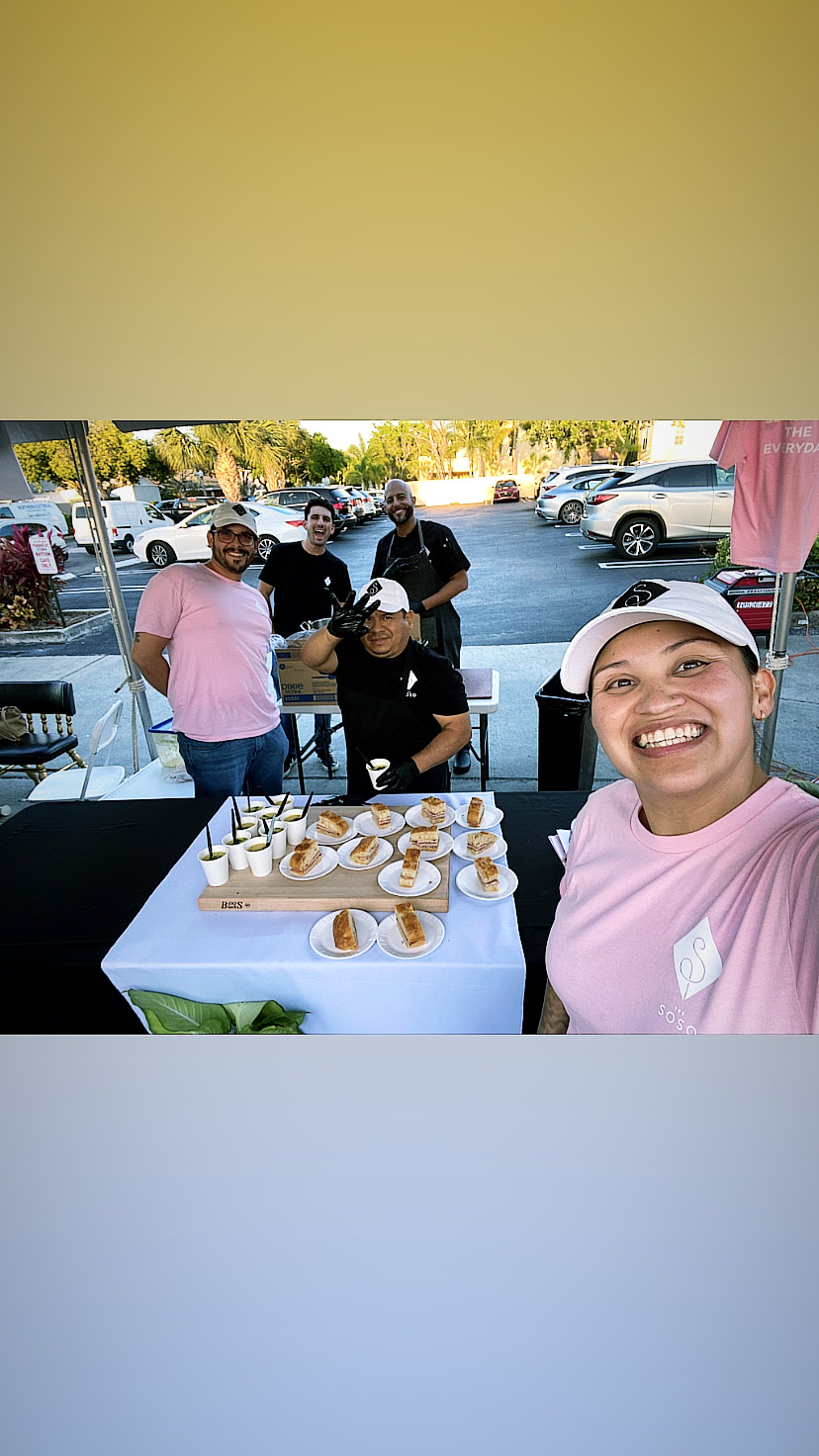 Team serving dessert samples at an outdoor tasting event