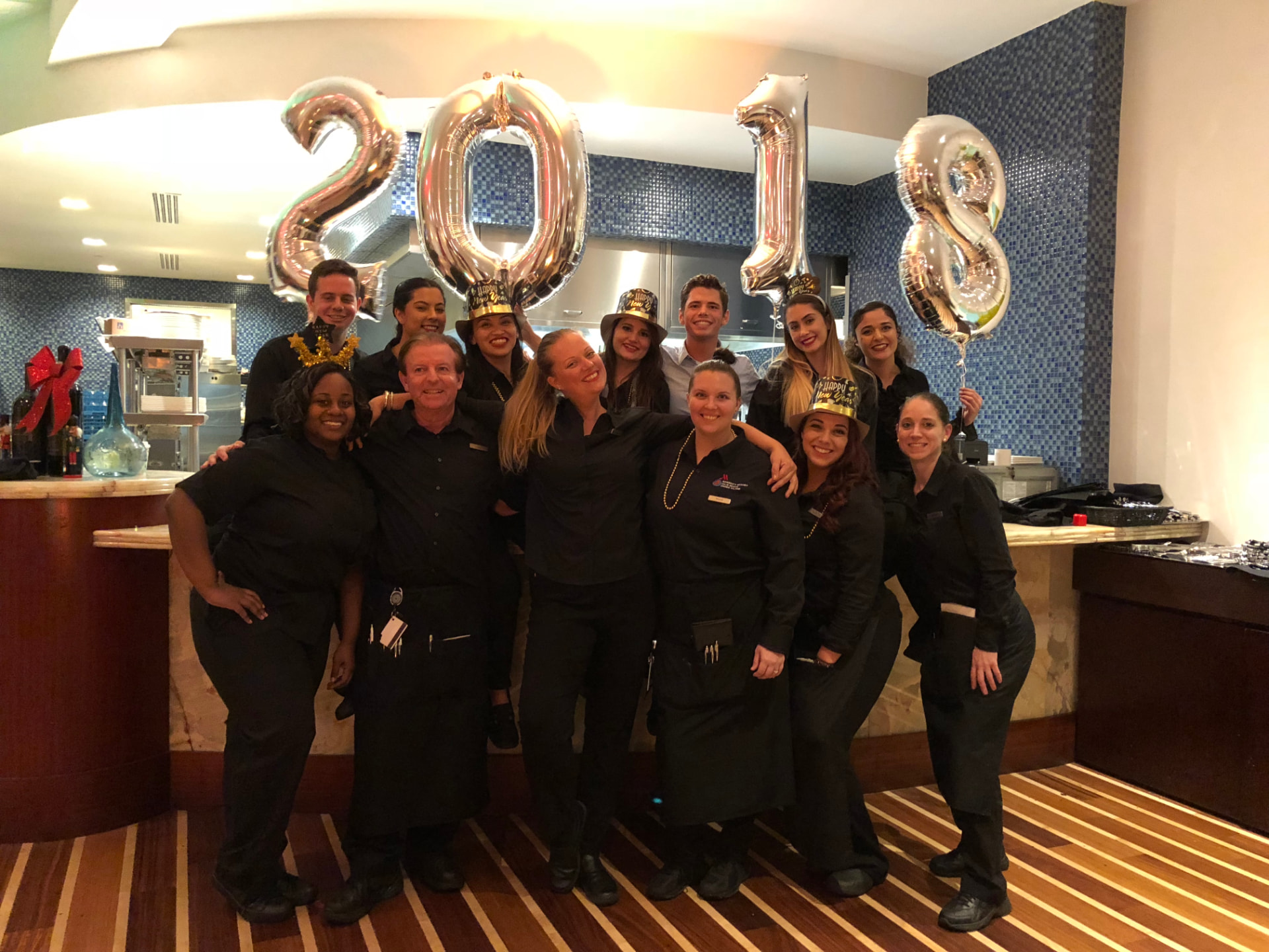 Restaurant team celebrating New Year together