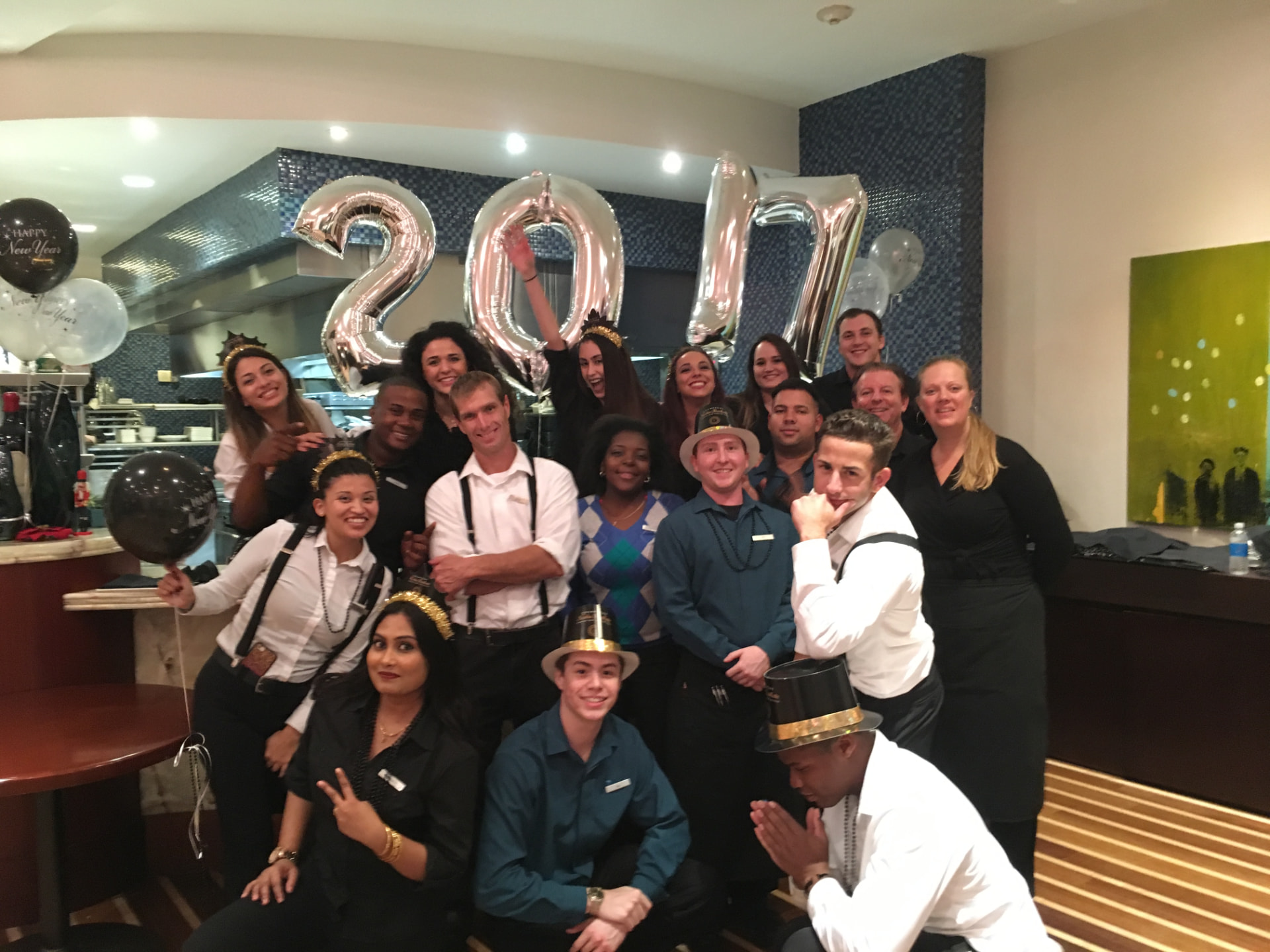 Hospitality team celebrating at a holiday staff party