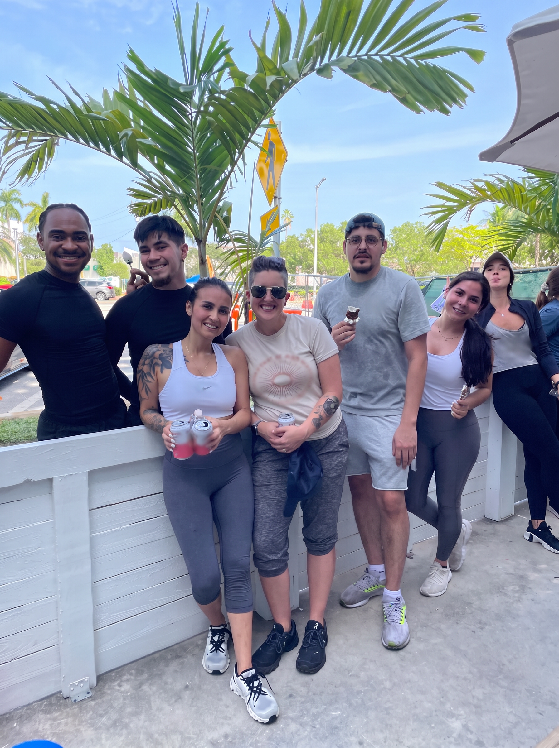 Team members gathered outside on the patio after a shift
